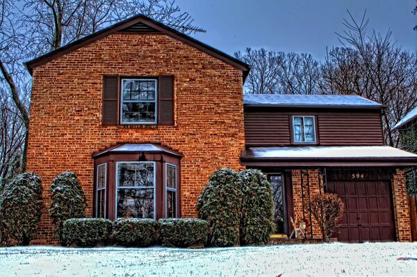 Winter house dusted with snow