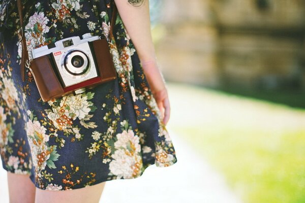 Beautiful photo of a girl with a camera