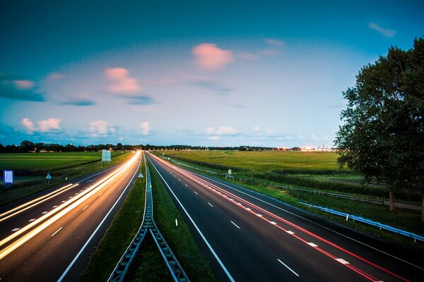 Autumn lights of the evening road in the Netherlands