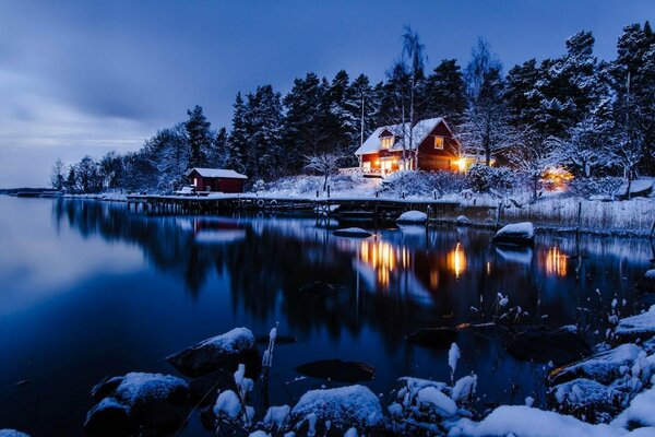 A house on the bank of the river evening