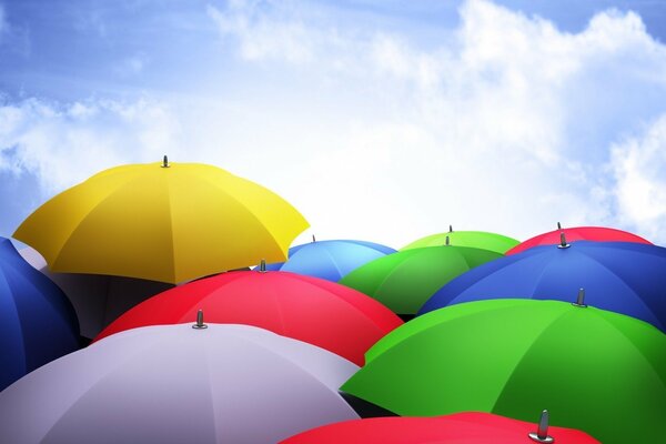 Bright multicolored umbrellas against the sky