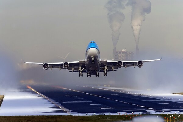 A civil aviation plane lands at the airfield