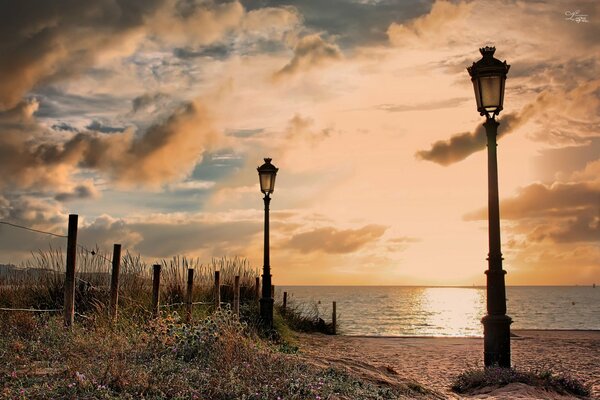 Lanterns and flowers on the shore in Spain