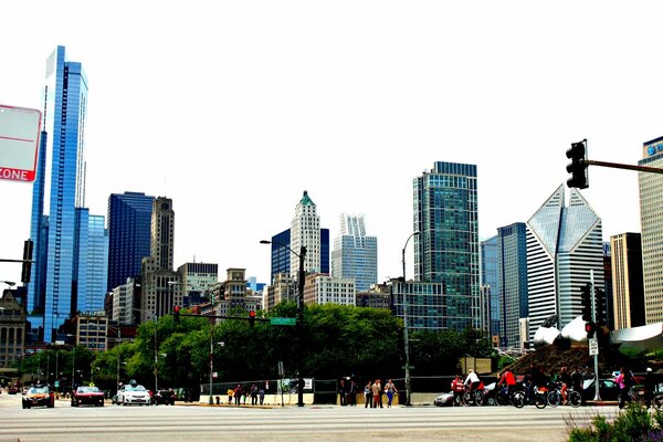 Skyscrapers among fussy people, cars