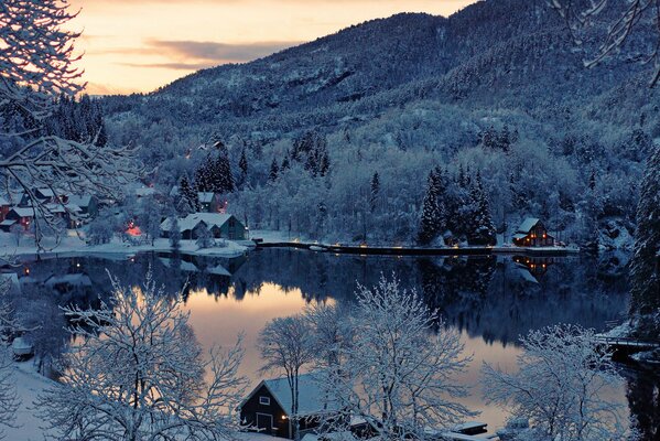 Winter Norwegian village on the shore