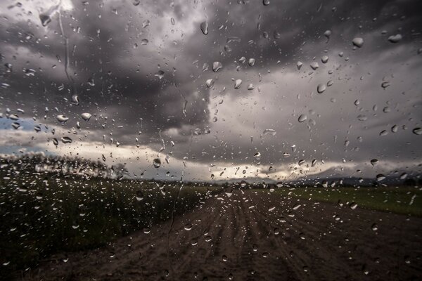 Raindrops on the glass. Clouds