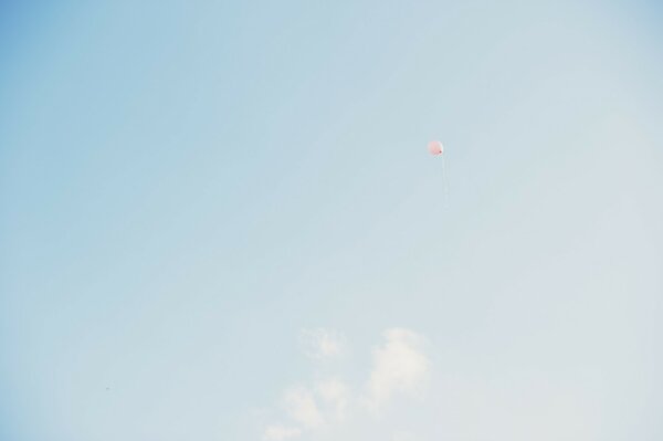 Pink ball in the blue sky