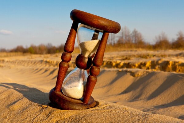 Bimsstein Uhr nk Sand Hintergrund