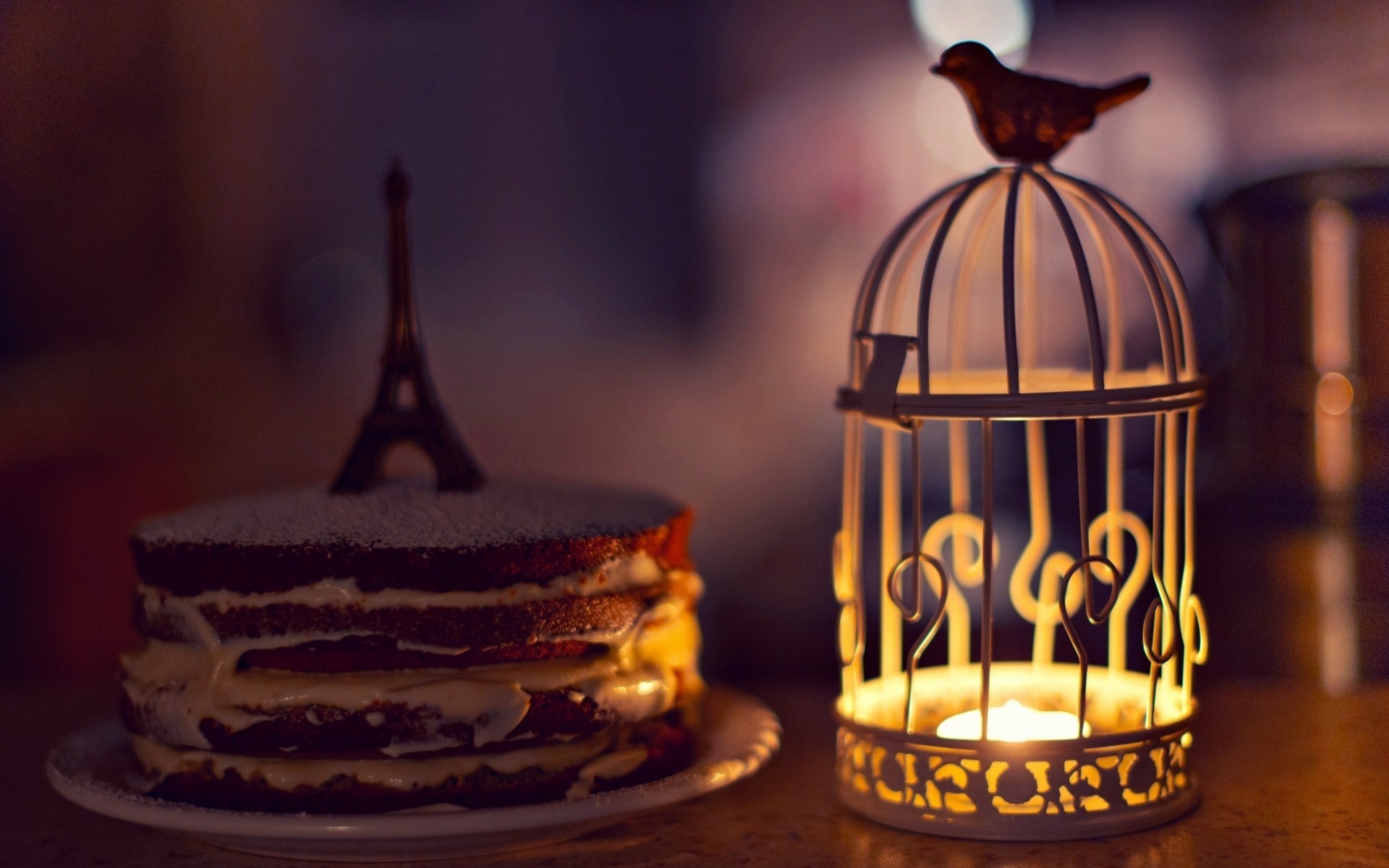 galleta torre eiffel humor vela pájaros crema linterna papel pintado pastel fondo estatuilla linterna jaula