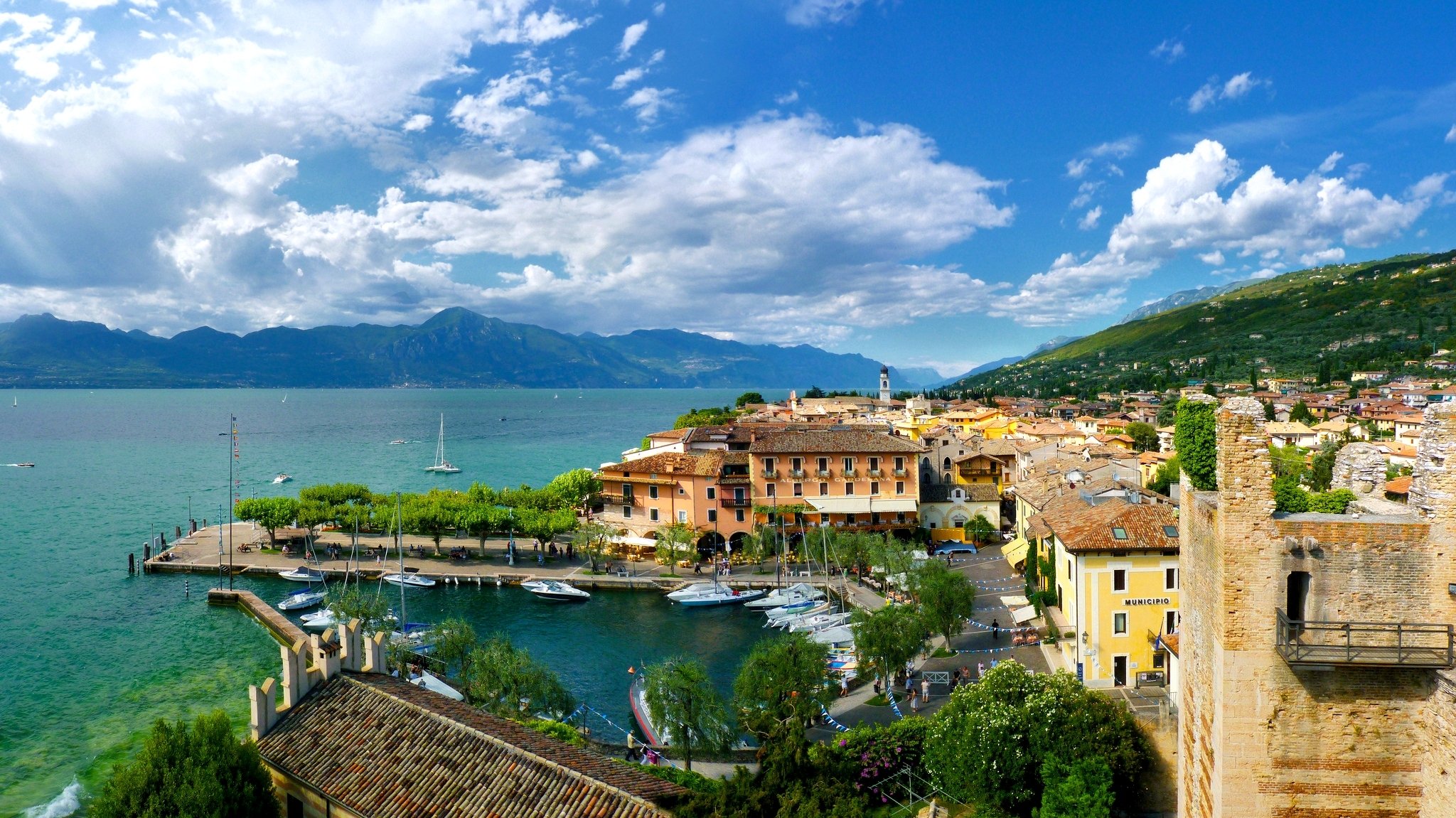 italy torri del benaco veneto torri del benaco castle nature trees mountains marina boats house