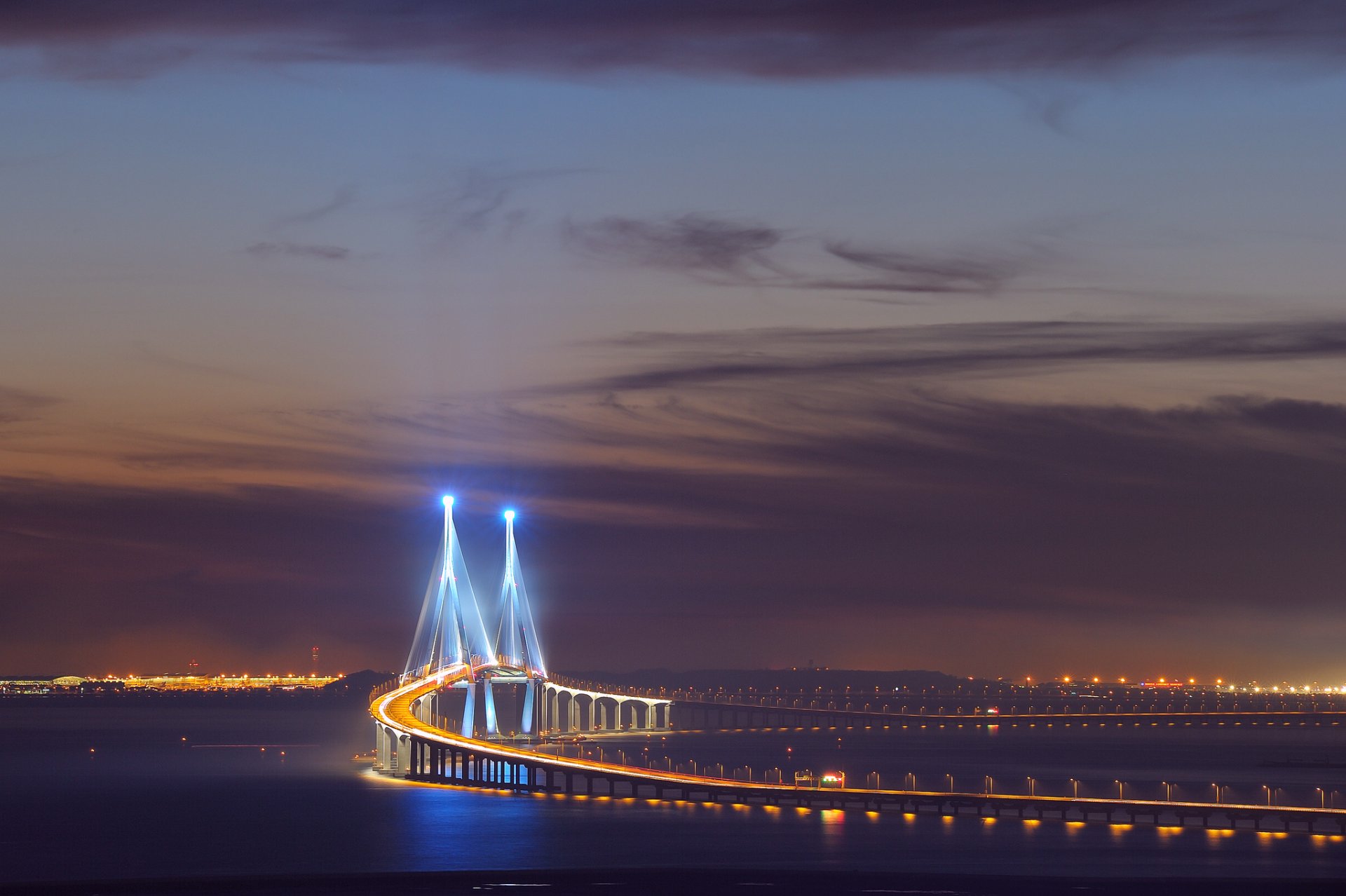 asia corea del sur ciudad incheon songdo puente iluminación exposición luces noche cielo nubes