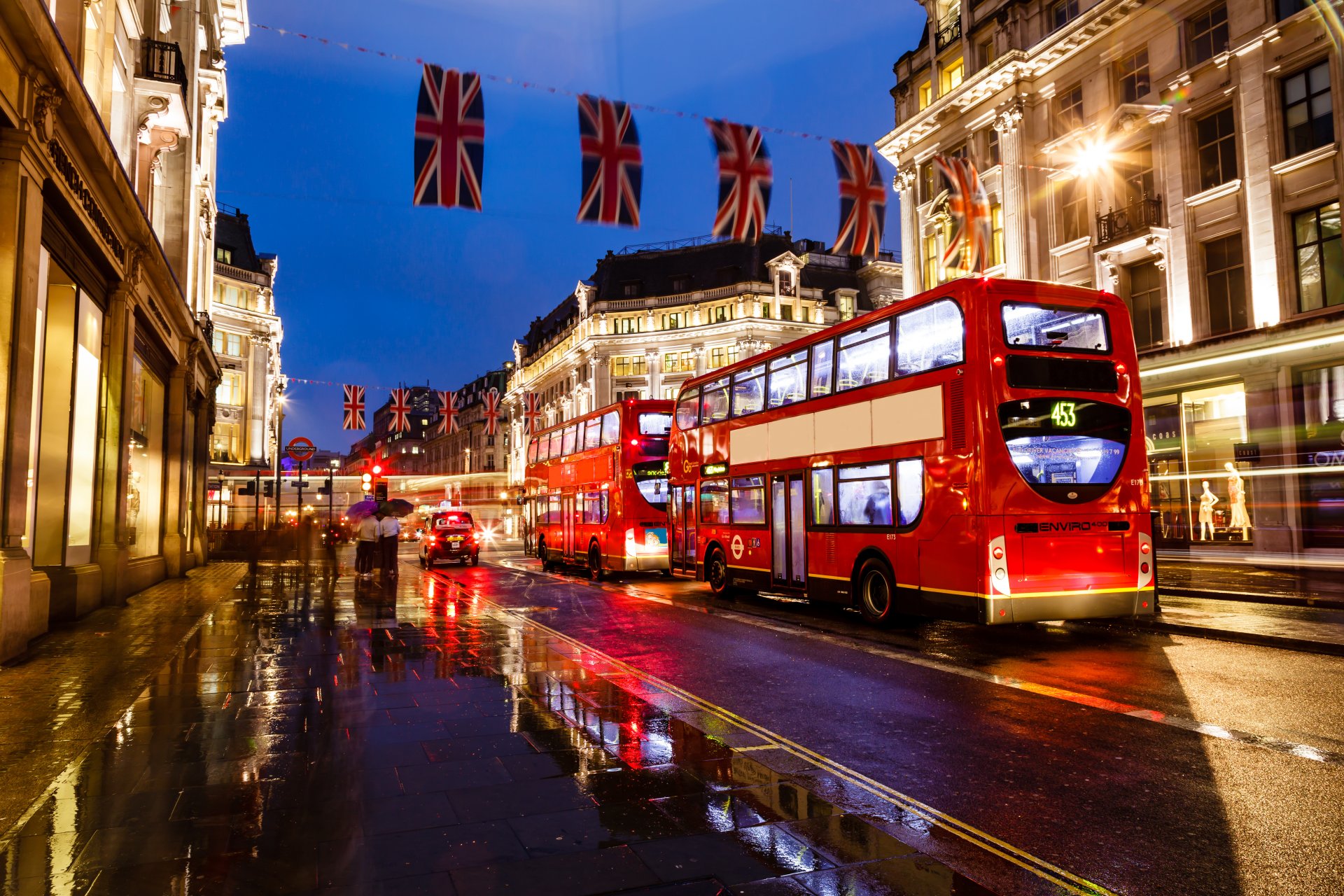 london england bus night street streetlights street lights building