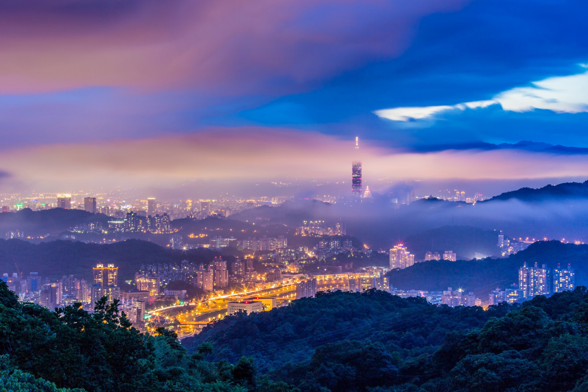 china taiwan taipei town night twilight mountain hills tree haze fog blue sky clouds the storm tower buildings house lights lighting views height panorama