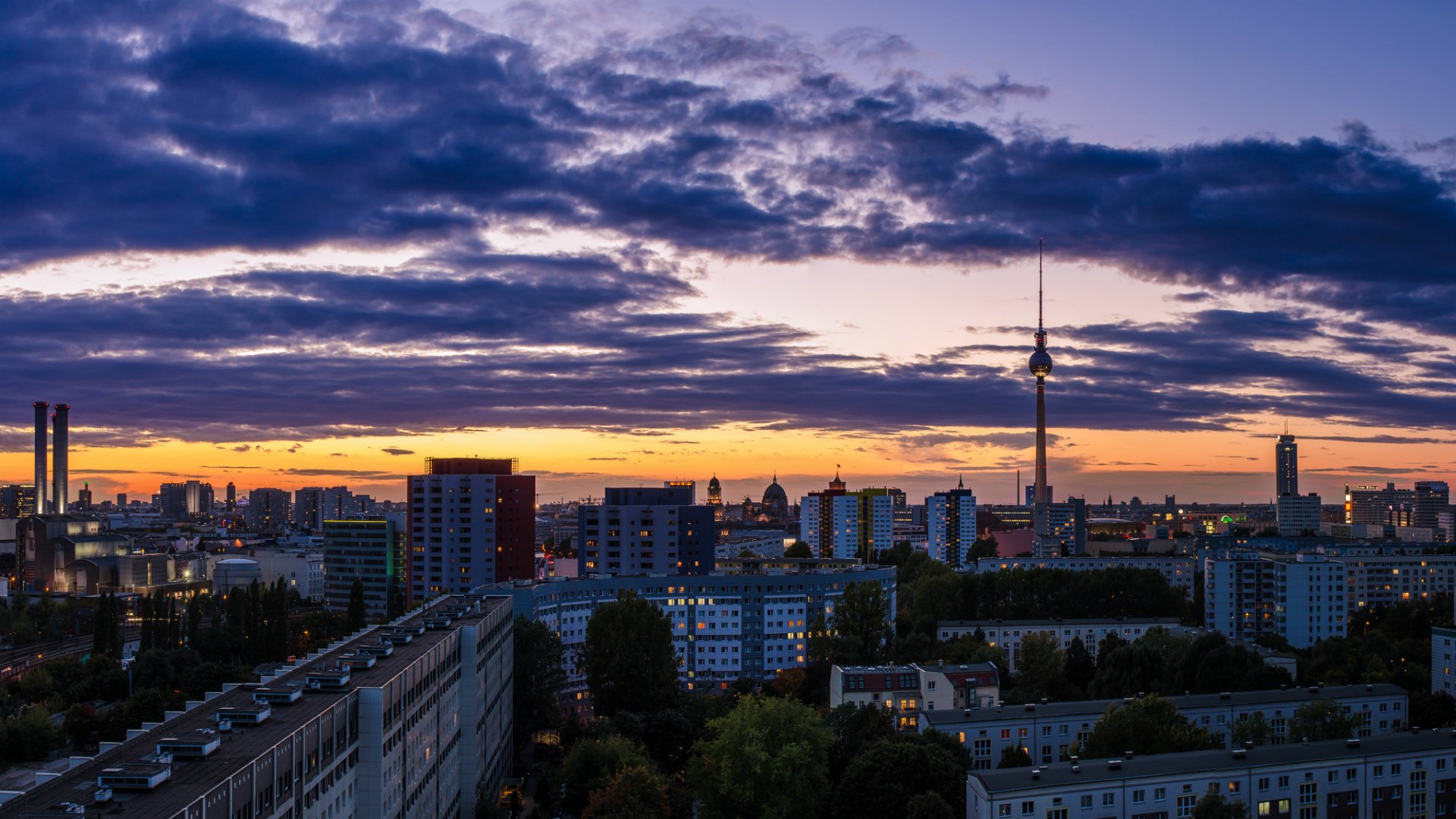 germany berlin city capital panorama houses buildings tv tower evening orange sunset lilac sky cloud