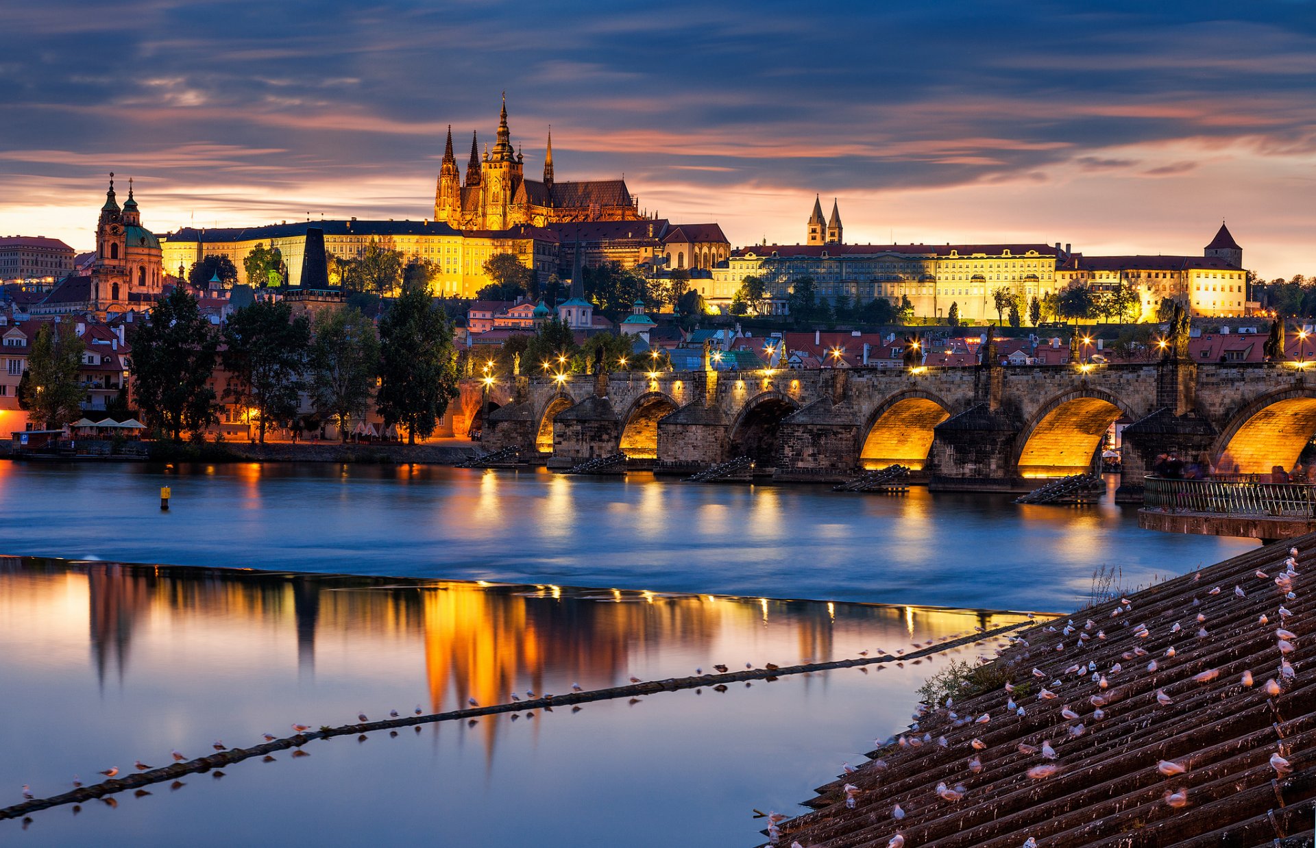 prague czech czech republic city bridge river vltava evening architecture building