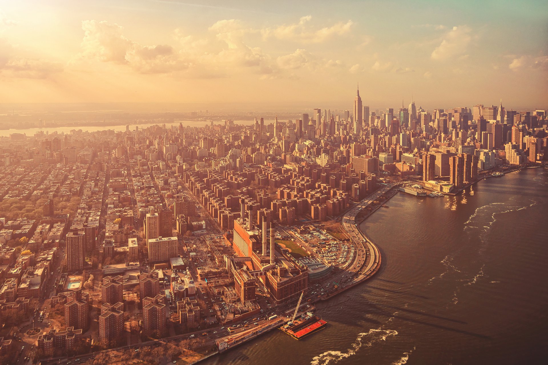 manhattan new york city town buildings sky clouds water wave