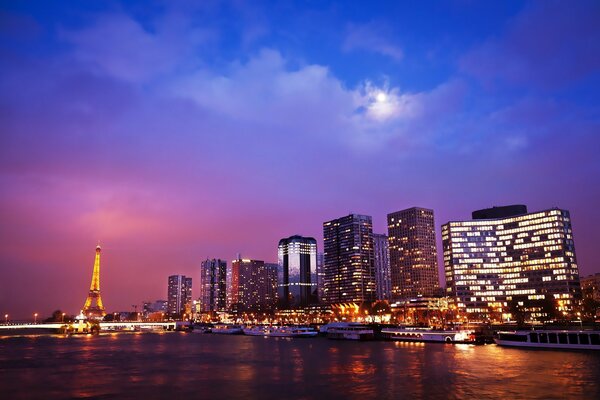 Lights of Paris on the background of the night sky