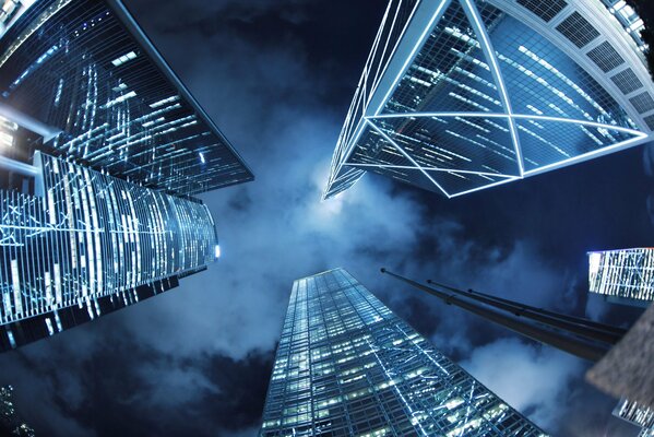 Three skyscrapers against the night sky