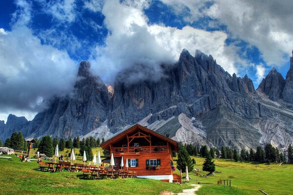 A house at the foot of the mountain ranges