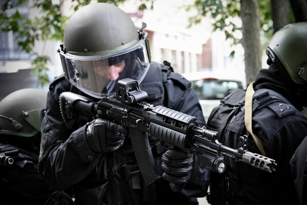 Special forces soldiers in a helmet on the assault