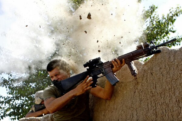 A soldier in a fortress that is being shelled