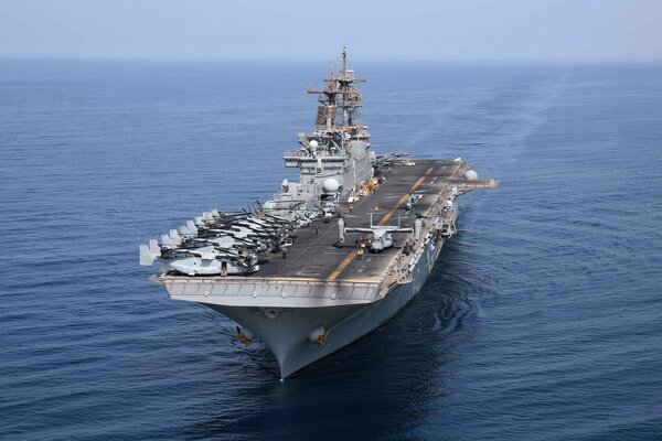 Landing ship in the blue sea