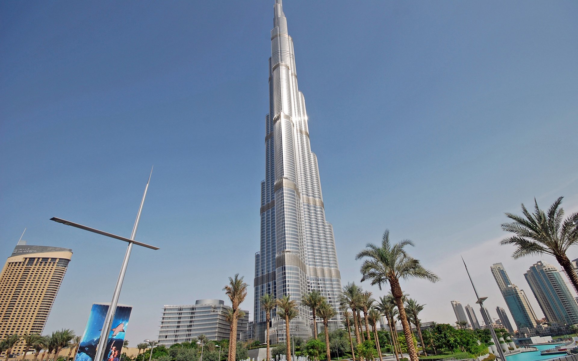 dubai wolkenkratzer türme häuser burj khalifa palme himmel