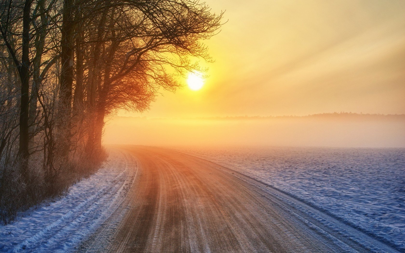 invierno carretera puesta de sol