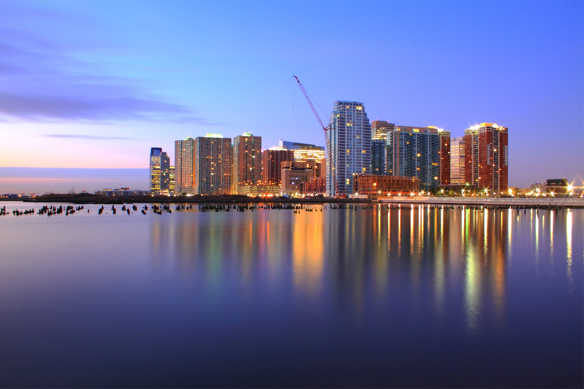 united states jersey city new jersey usa the port purple night pink sunset sky clouds skyscraper light lights river hudson reflection