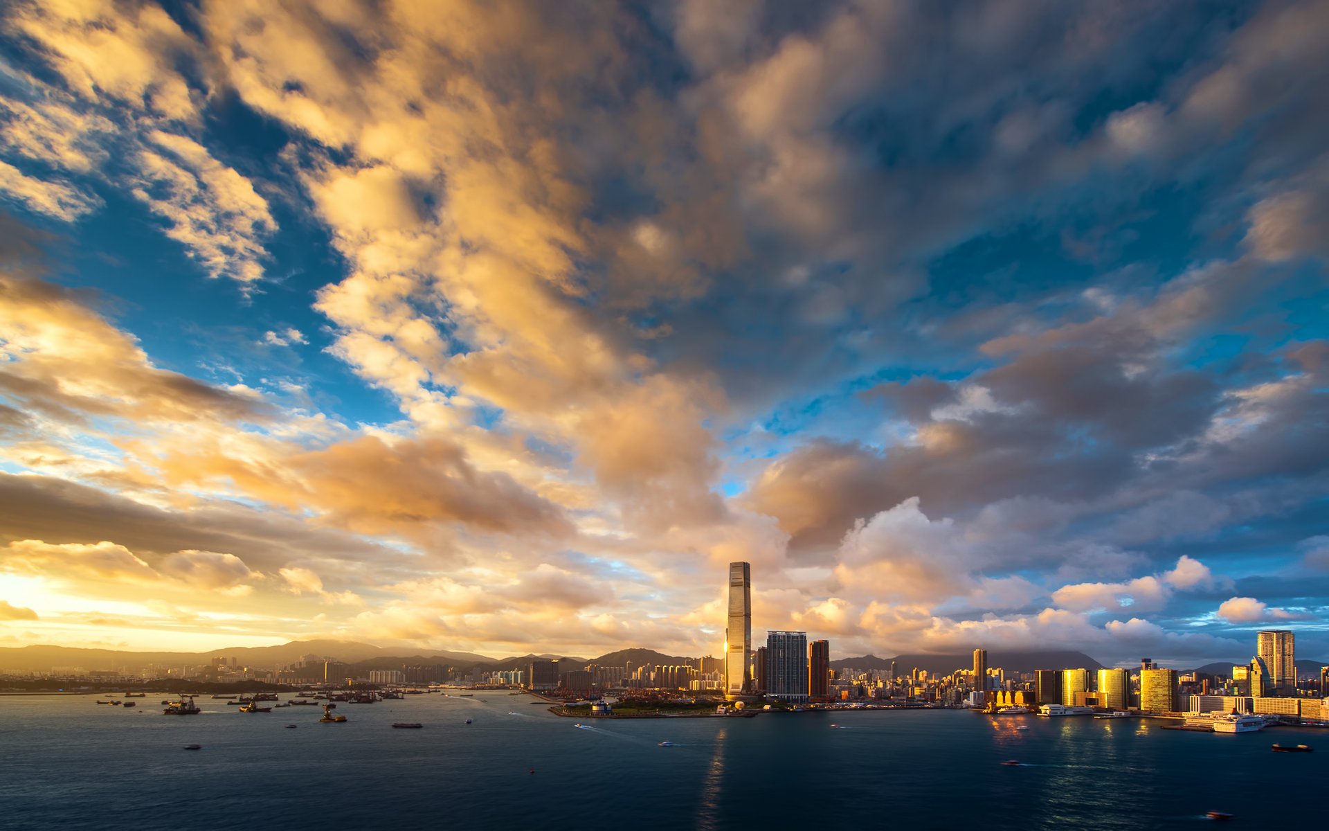 hong kong sera tramonto cielo nuvole edifici grattacieli baia porto metropoli