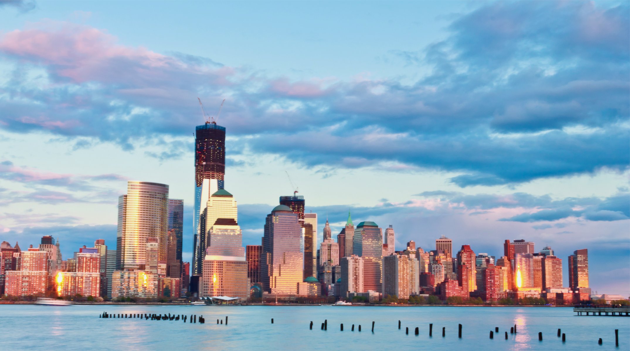 usa new york metropolis buildings skyscrapers river evening sunset turquoise sky cloud