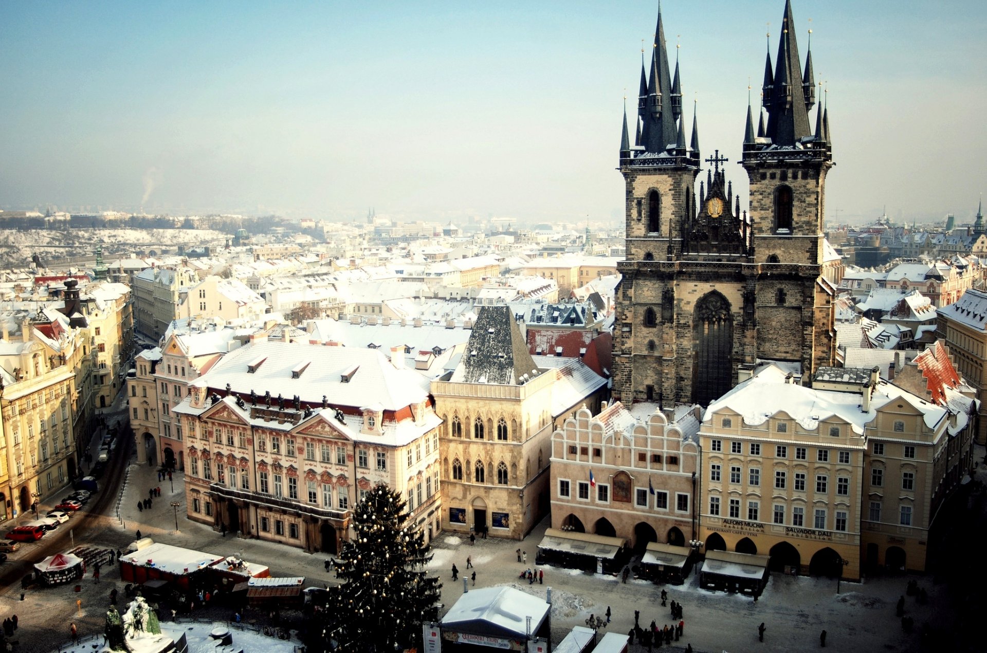 prague czech czech republic city old town square tyn temple christmas tree winter snow people