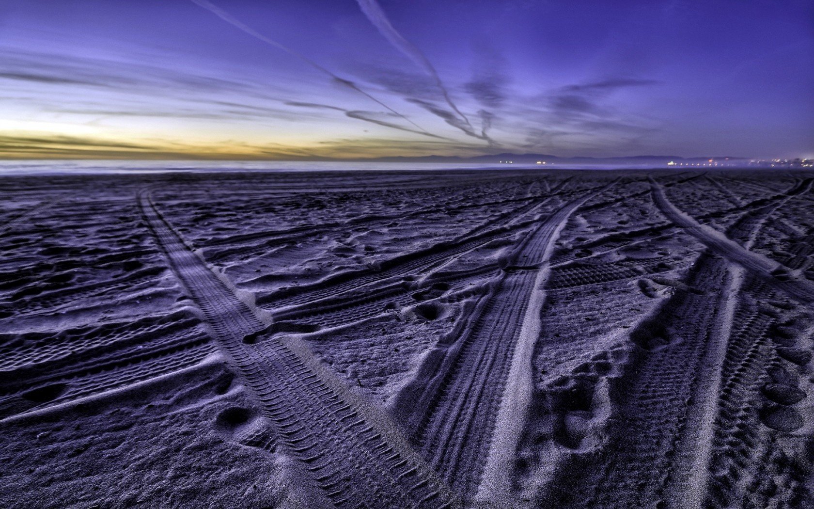 playa arena mar noche