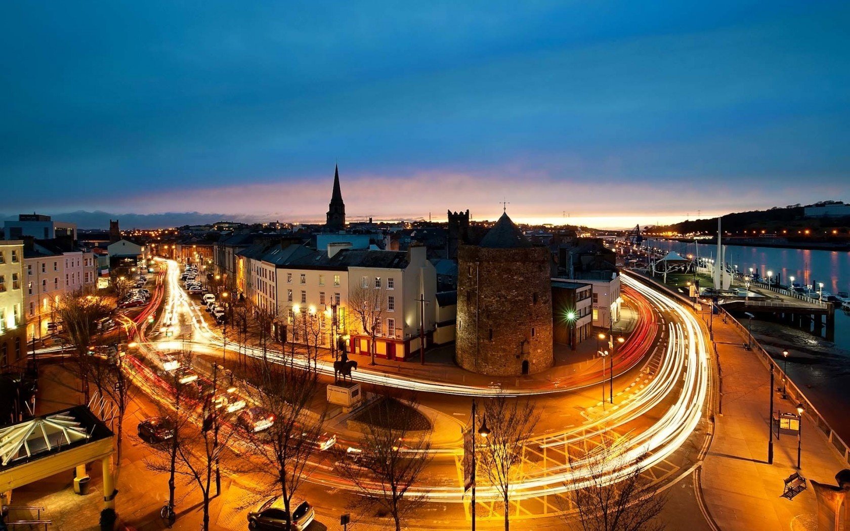 ville de nuit lumières coucher de soleil rues