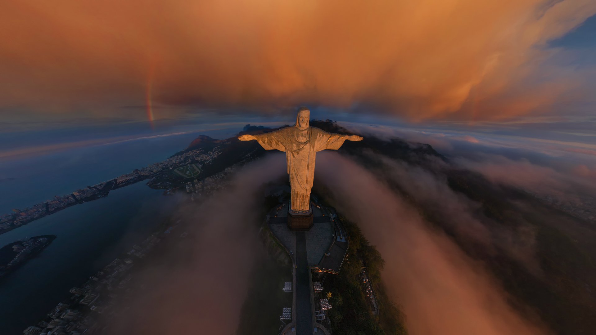 rio de janeiro rio de janeiro miasto posąg chrystusa odkupiciela cristo redentor tęcza chmury wschód słońca