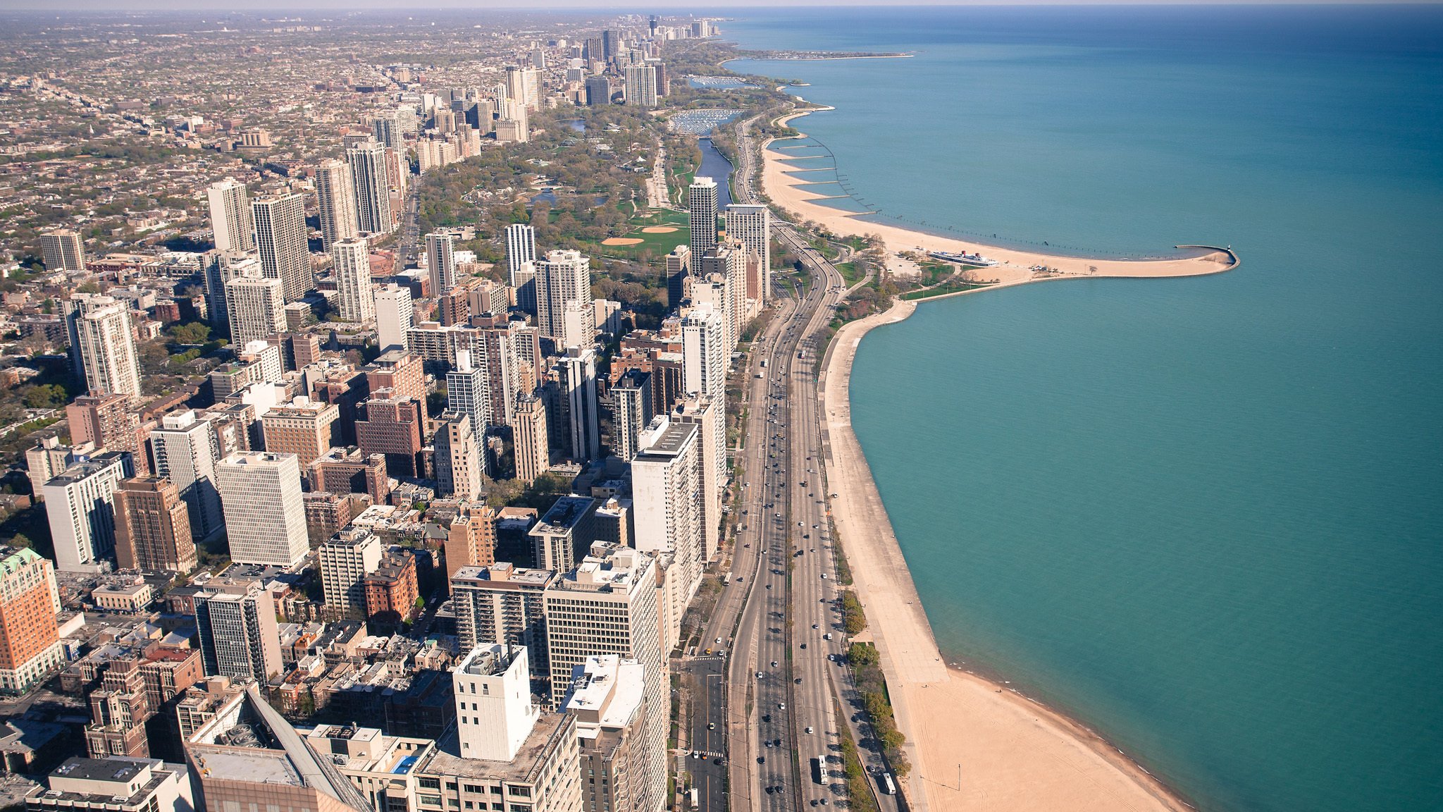 stati uniti illinois chicago illinois città strade costa costruzioni oceano spiaggia grattacieli trasporto macchine stadio parco frangiflutti