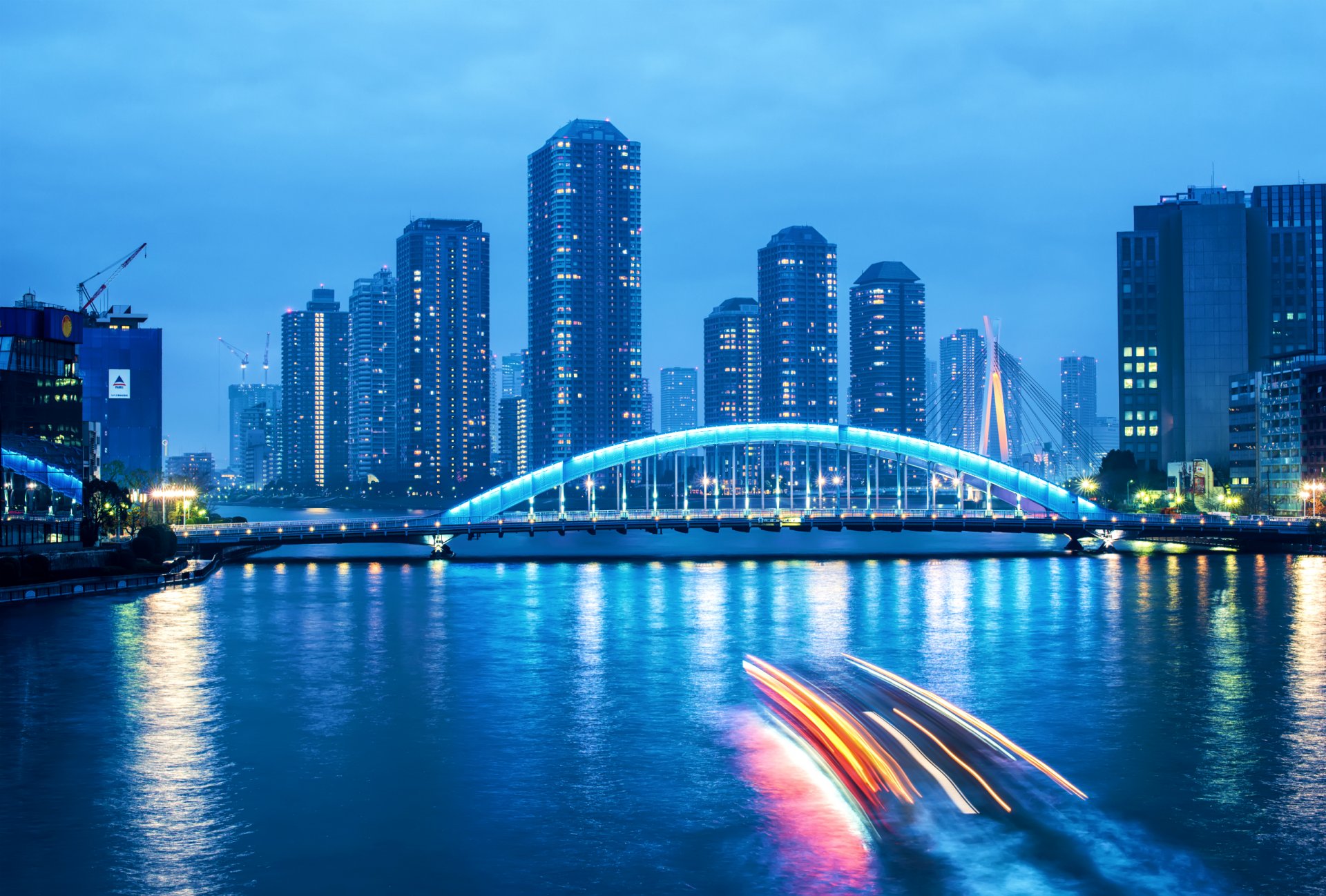 japan tokyo capital metropolis skyscraper night twilight bridge light extract lights river blue sky cloud