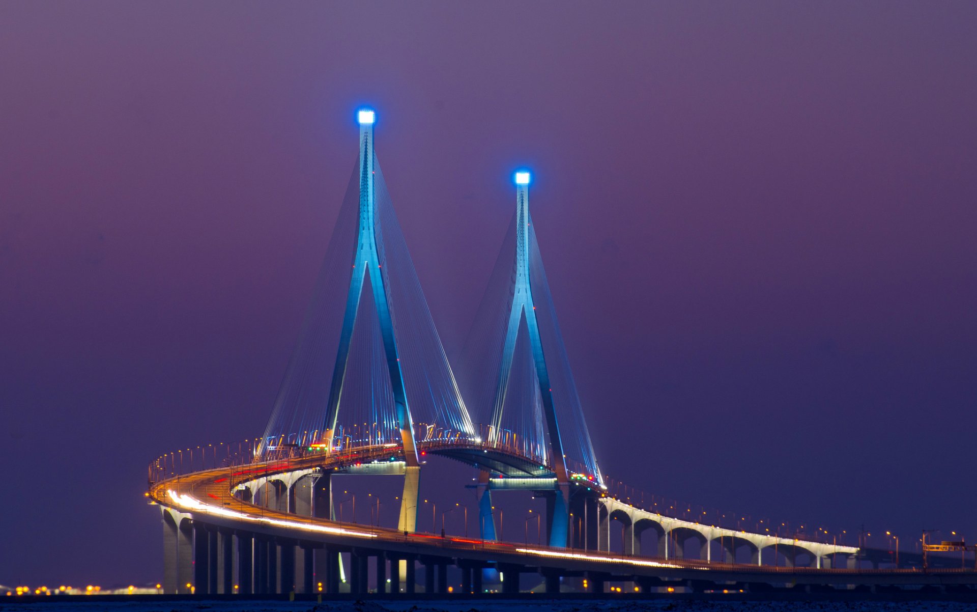 asia corea del sur ciudad songdo puente iluminación exposición luces noche lila púrpura cielo