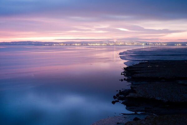 Evening lights in the bay of the lake