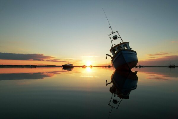 Ships on the lake during sunset