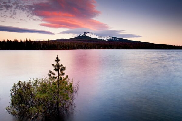 High mountains and a lake at sunset