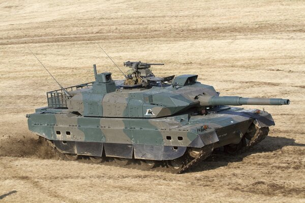 Military tank on the field in summer