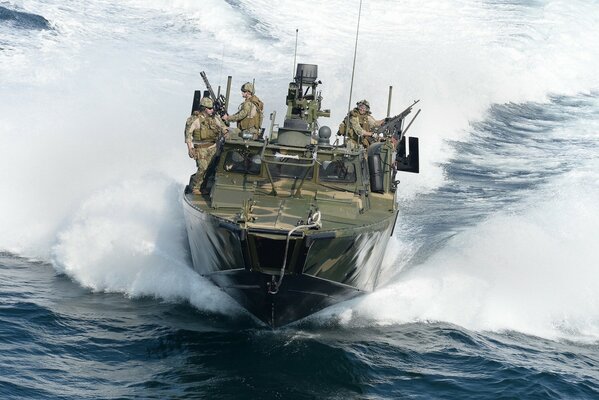 Armed soldiers sailing on a boat