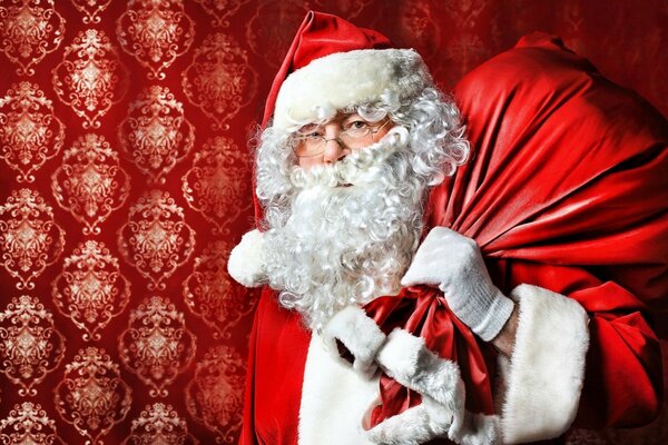 Papá Noel con barba y bolsa de regalos