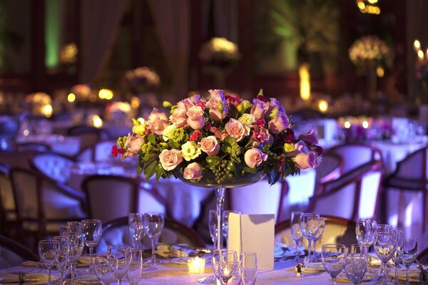 Beautifully decorated table with flowers in the restaurant