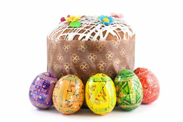 Easter cake and eggs on a white background