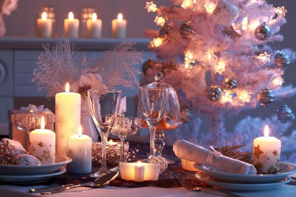 Romantic atmosphere with candles and beautiful dishes