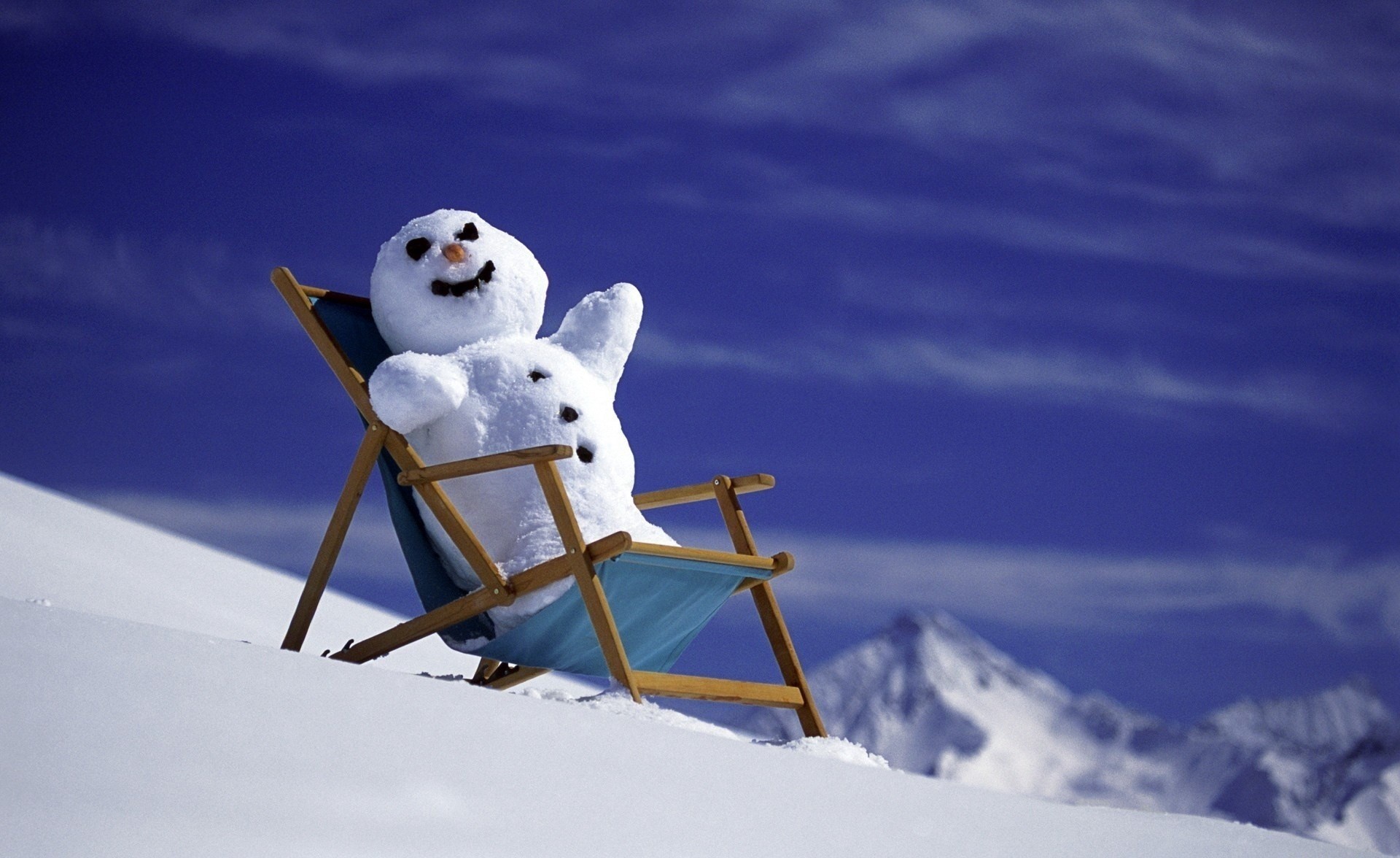 un snowman mountain snow new year