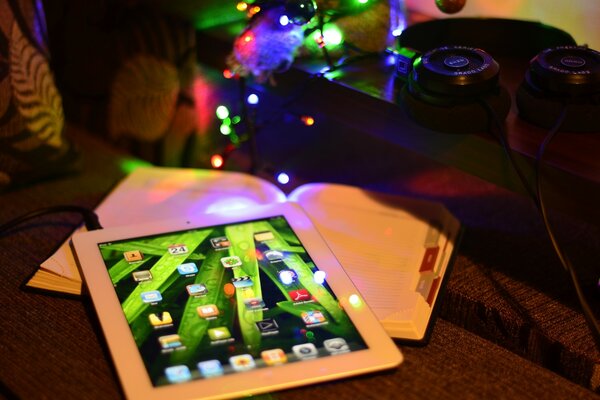 Cozy atmosphere with a book and a garland