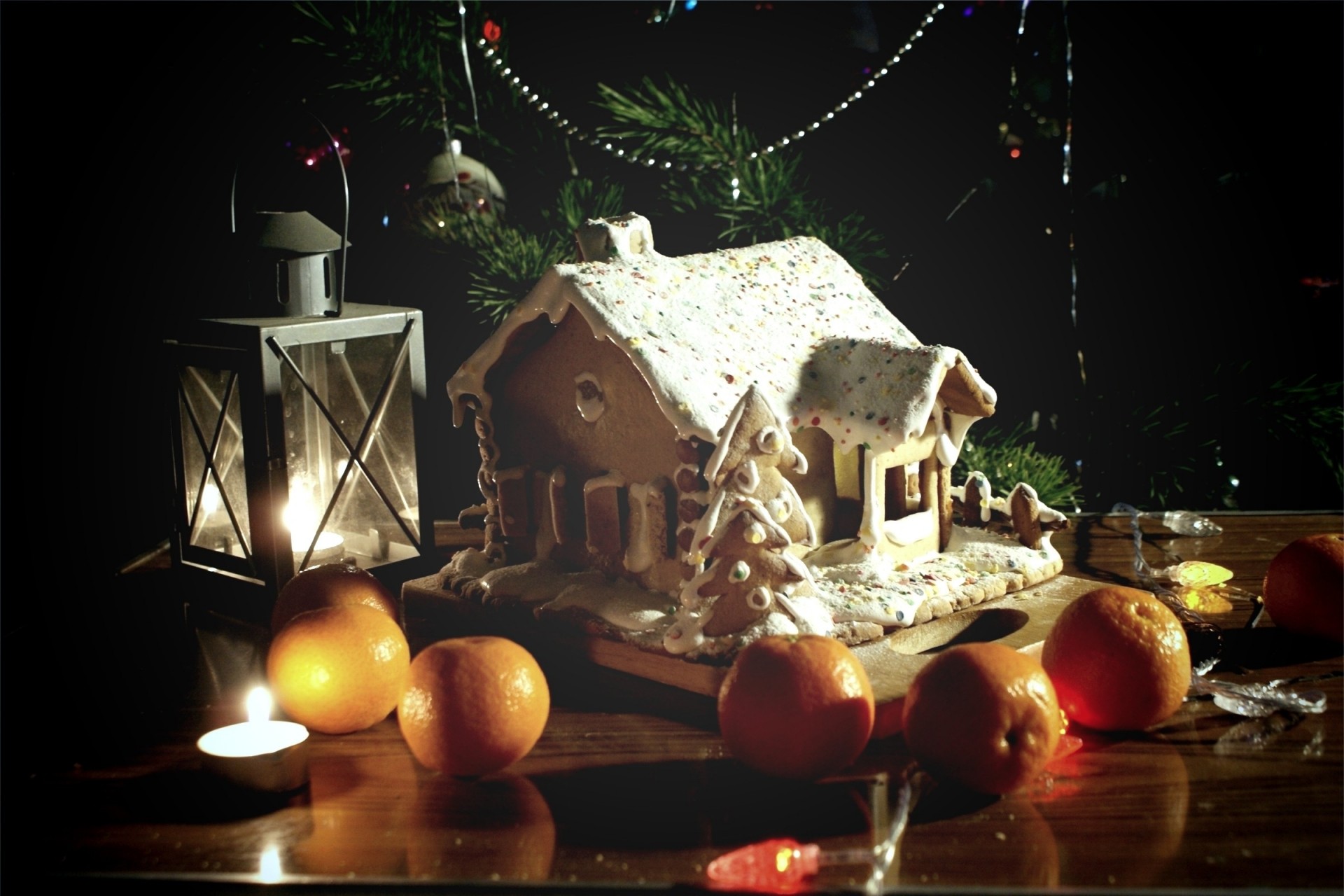 mandarinas árbol de navidad linternas naranja casa de pan de jengibre